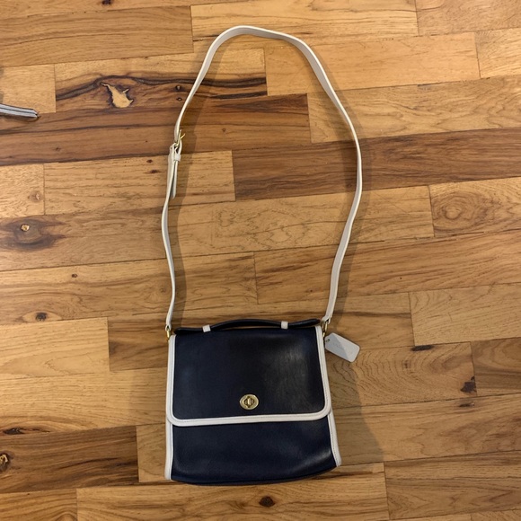 navy and cream bag
